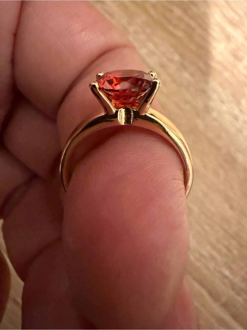 Gold Ring with Orange Gemstone Solitaire